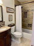 Newly renovated bathroom with tub